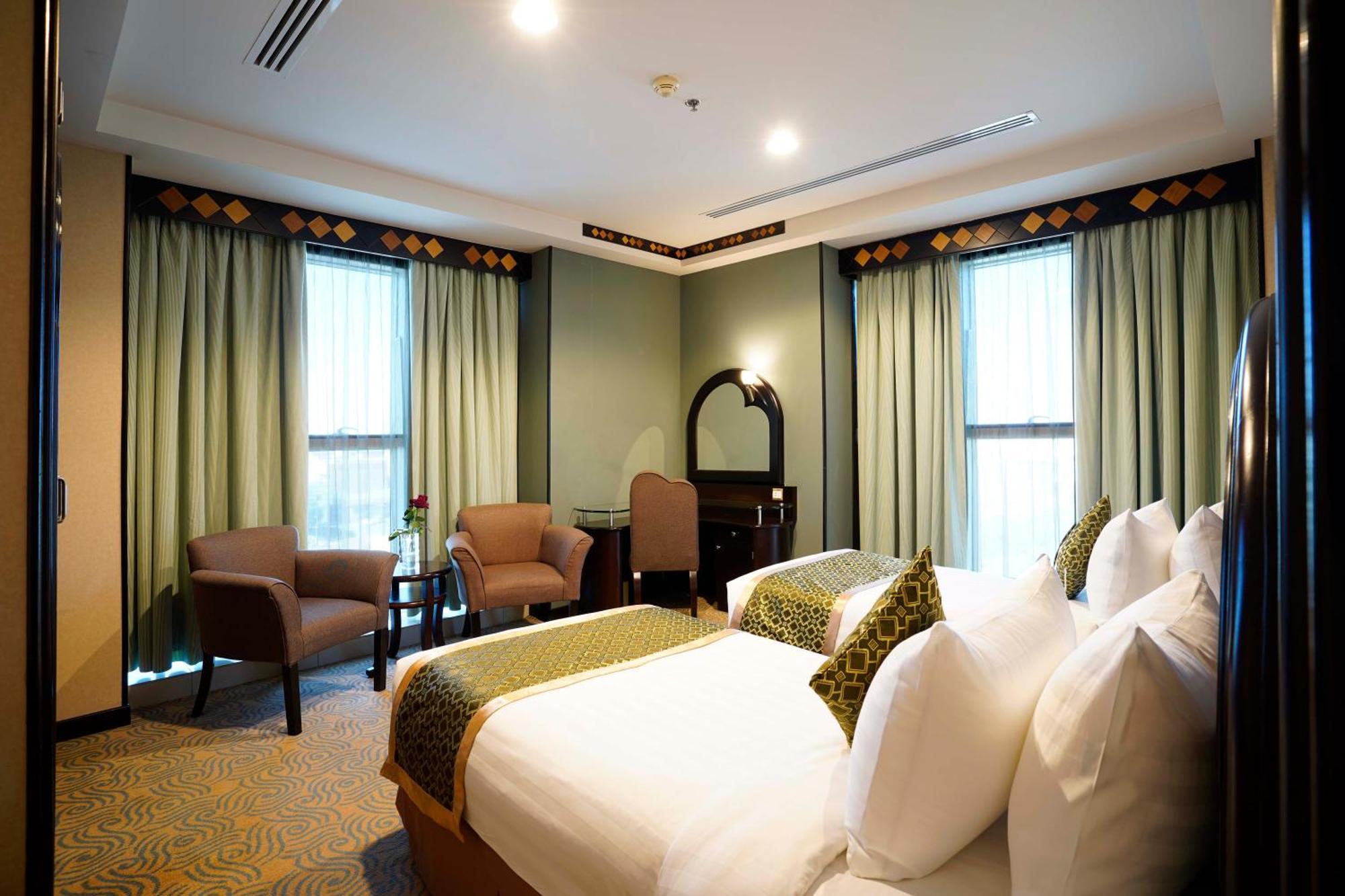 טאיף Awaliv International Hotel חדר תמונה A bedroom at the hotel
